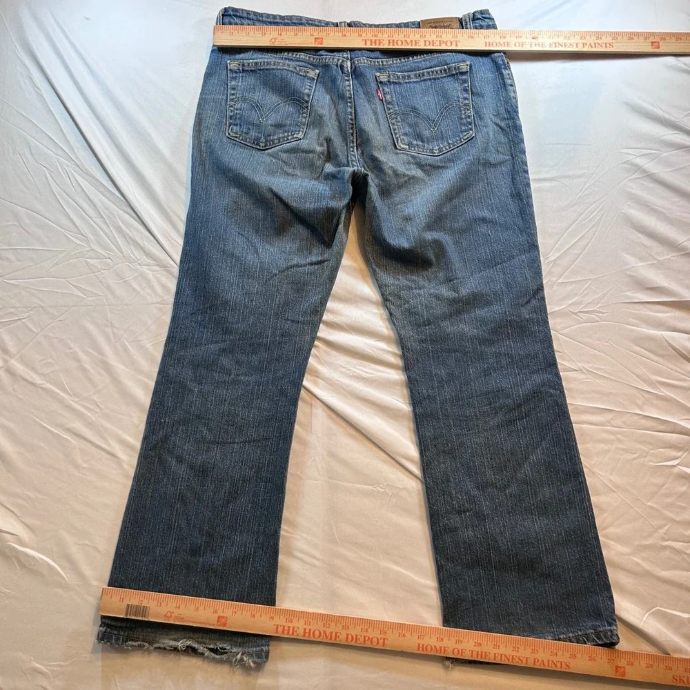 Levis 515 Boot Cut Jeans Mens 36x31 Blue Medium Wash Distressed Hem Denim